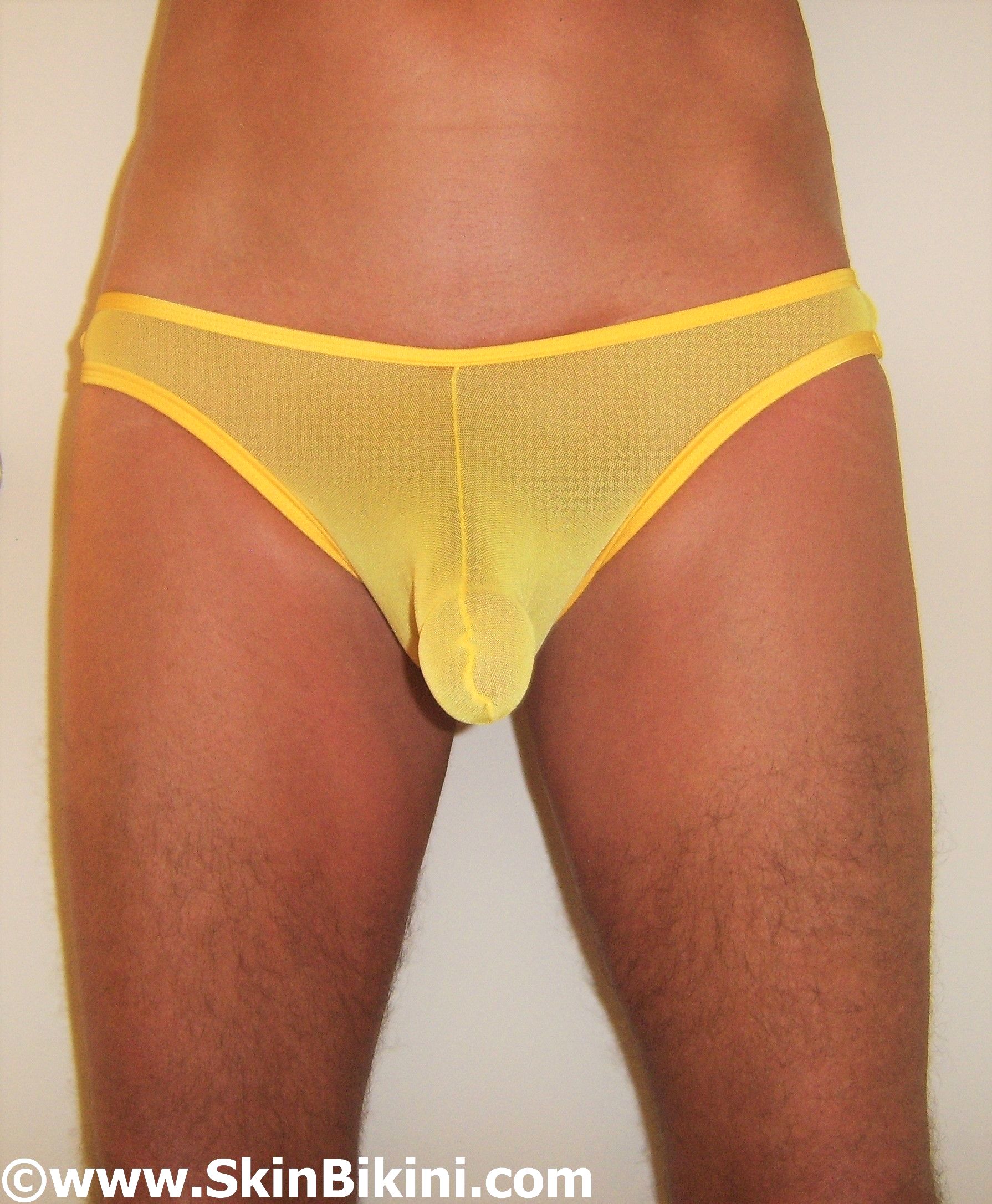 men's see-thru cock ring bikini thong in yellow front view