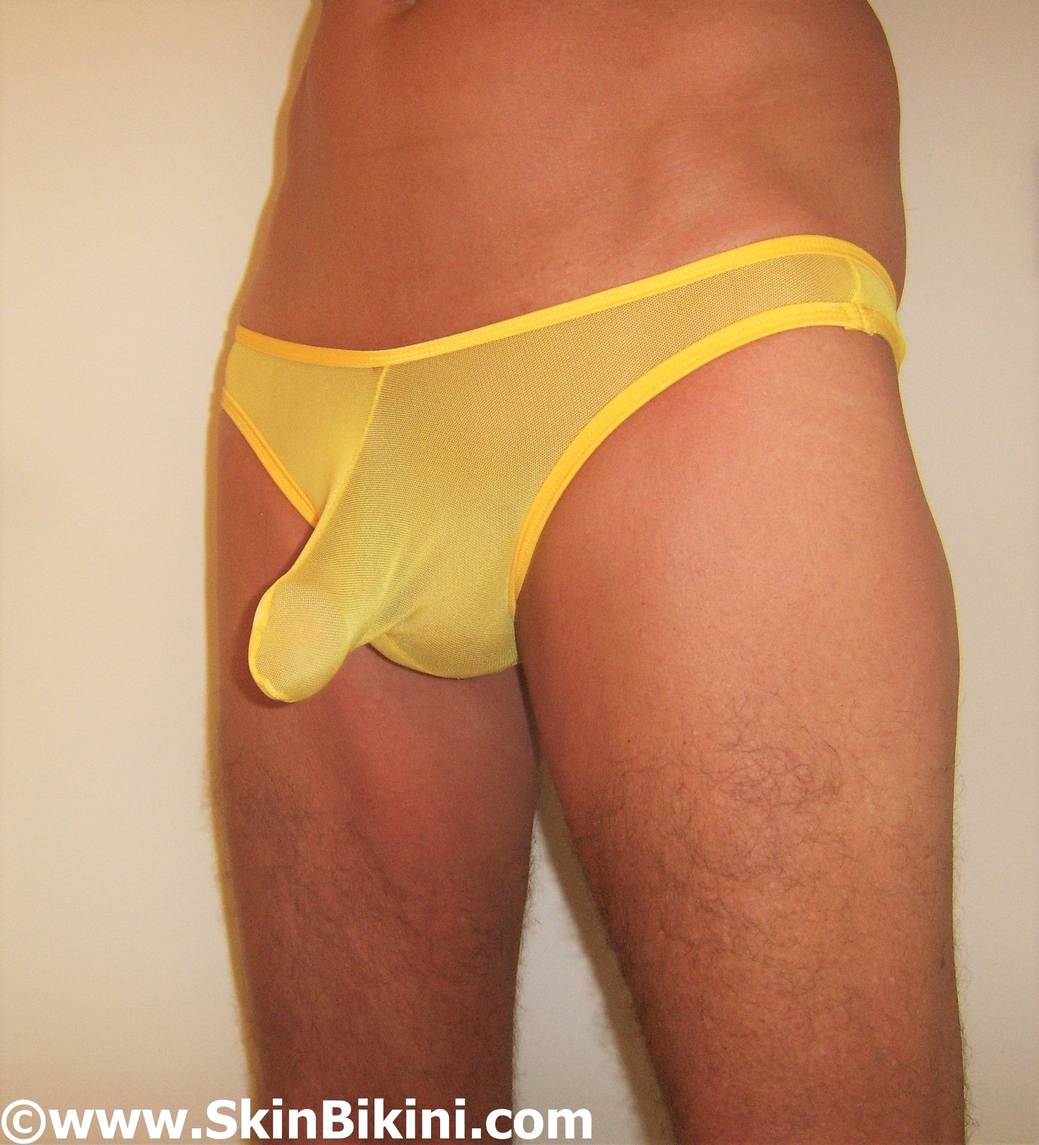 men's see-thru cock ring bikini thong in yellow front view